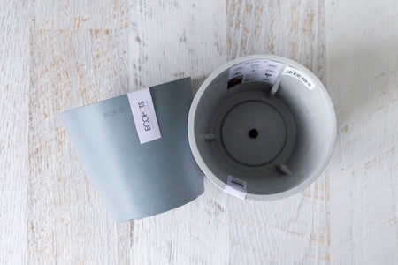 One blue Amsterdam ecopot on the side one grey interior top view