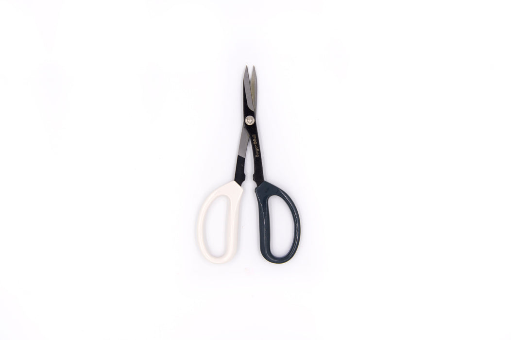 Grey and white scissors on white background
