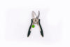 Green and stainless steel pruner on white background