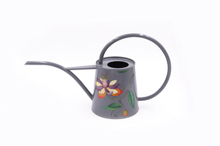Grey watering can with picture of a flower on white background