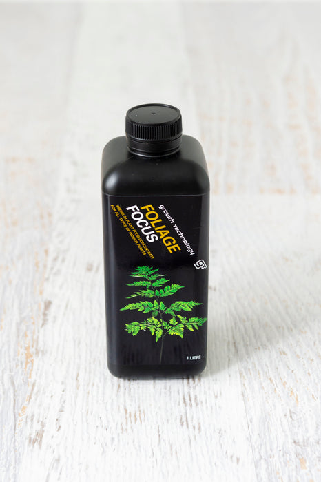Foliage Focus nutrient in black plastic bottle