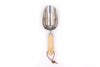 Stainless steel compost scoop with brown leather hanging cord